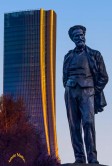 Statue Of Composer Giuseppe Verdi With Generali Tower in Backgroung