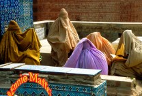 Women Praying At Mausoleum